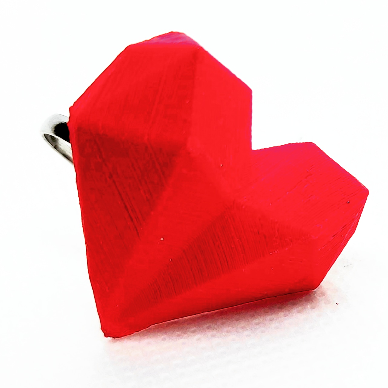 Anillo corazón geométrico