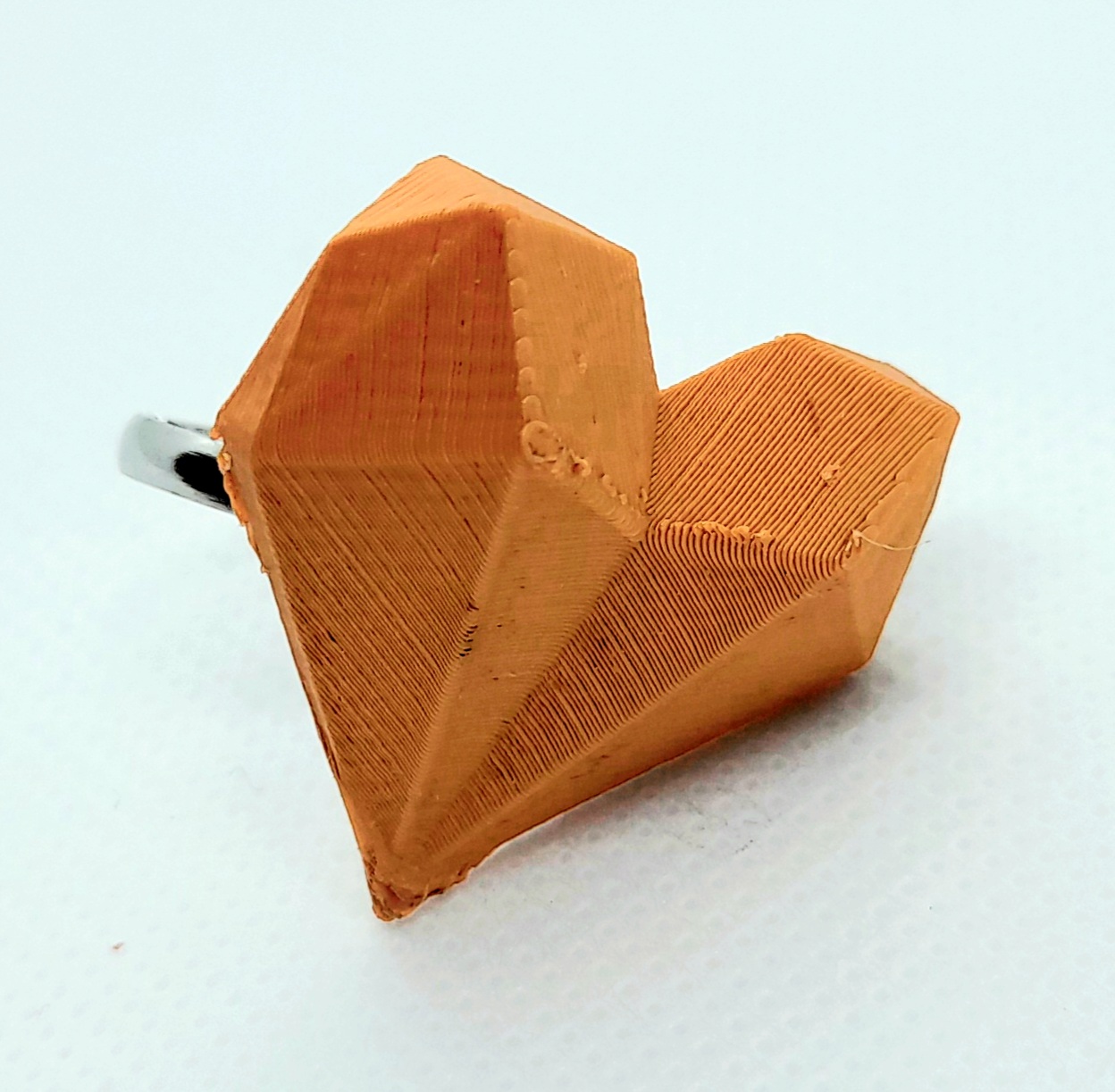 Anillo corazón geométrico