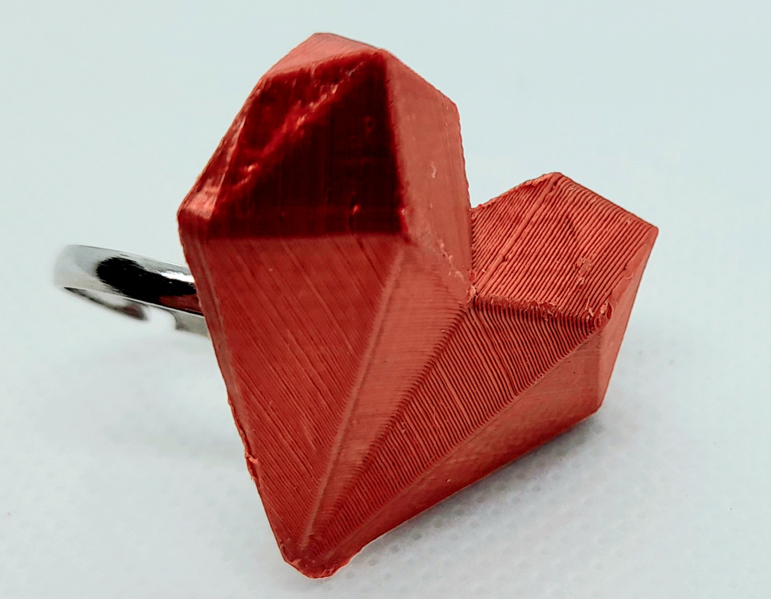 Anillo corazón geométrico