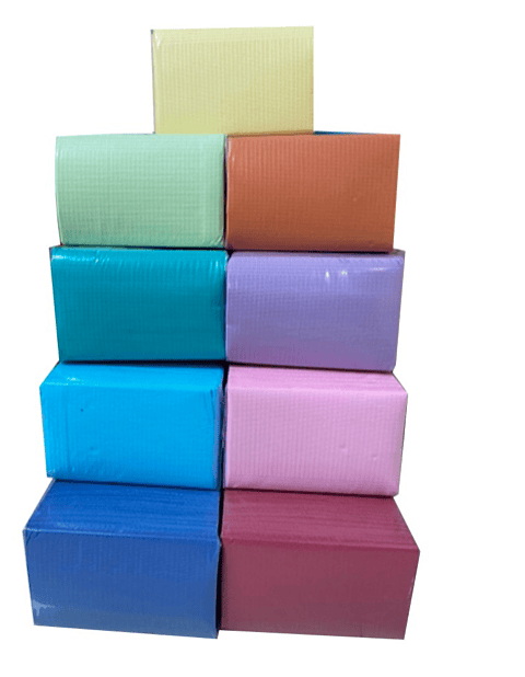 BABEROS / SERVILLETAS COLORES PAQUETE 100 UNID