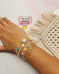 Juego de Pulseras flores 