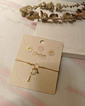 Pulsera de hilo con margarita
