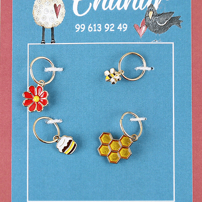 Marcadores de puntos de abejita y flor roja