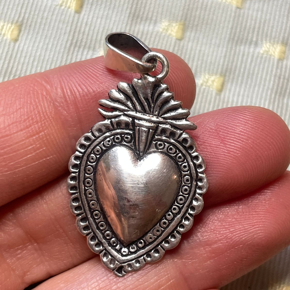 Detente pequeño en plata 950