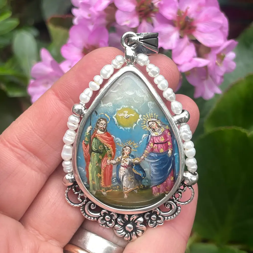 Maravillosa medalla de la Sagrada Familia y la Virgen del Rosario 