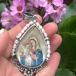 Maravillosa medalla de la Sagrada Familia y la Virgen del Rosario 