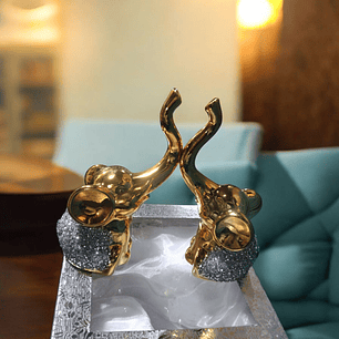 Elefantes dorado con piedras 