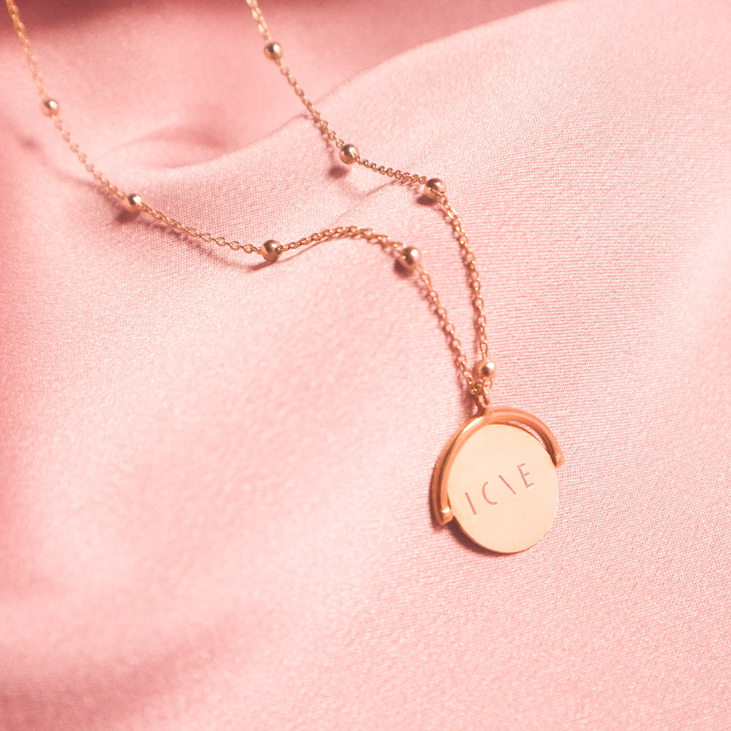 Colar com medalha giratória  3