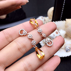 Aretes forma de agua con citrino amarillos de imitación y circonias en cobre blanco 2