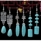 Aretes colgantes estilo alargado con tuquesa natural en cobre blanco y detalle de flor plateado antiguo 2