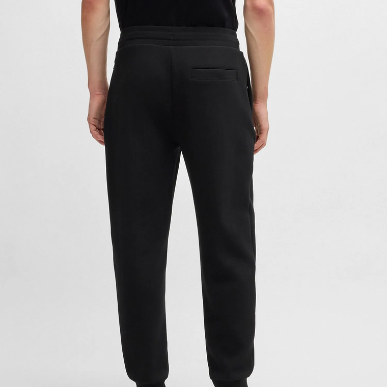 PANTALONES DE CHÁNDAL DE ALGODÓN CON LOGO APILADO PANTALONES RELAXED FIT HOMBRE 2