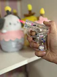 Encendedor Recargable Hello Kitty – Pistola Transparente con Luz y Flama Rosada - Miniatura 3