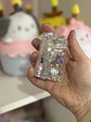 Encendedor Recargable Hello Kitty – Pistola Transparente con Luz y Flama Rosada - Miniatura 1