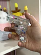 Encendedor Recargable Hello Kitty – Pistola Transparente con Luz y Flama Rosada - Miniatura 2