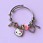 Pulsera Hello Kitty con Dijes y Cristales Rosa + Bolsita de Regalo - Miniatura 1