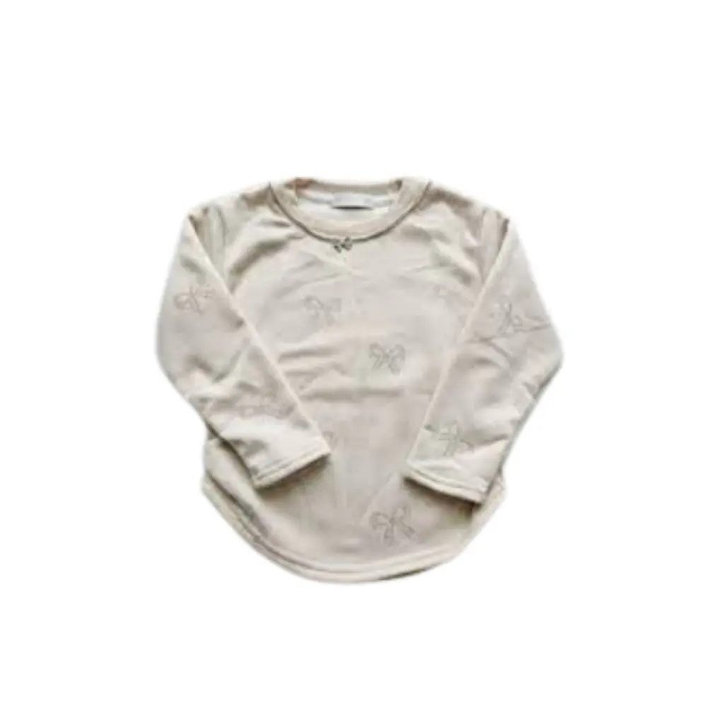POLERA NIÑA CON DISEÑO DECORATIVO PEQUEÑOS LASOS BRILLANTES 