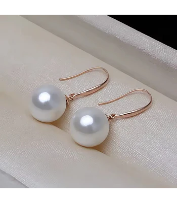 FINOS  Y ELEGANTES AROS DE PERLAS CULTIVADAS REDONDAS ENGARZADOS EN ORO DE 18 K   PERLAS 8 MM 