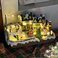 VILLA NAVIDEÑA CON MUSICA LUZ Y MOVIMEINTO DOBLE PISTA Y ARBOL - Miniatura 2