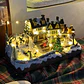 VILLA NAVIDEÑA CON MUSICA LUZ Y MOVIMEINTO DOBLE PISTA Y ARBOL - Miniatura 5