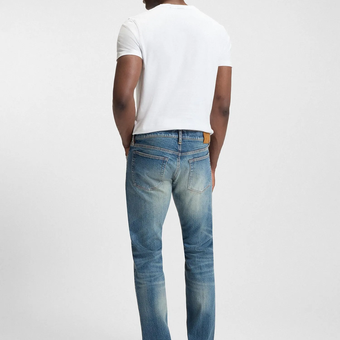 JEANS SLIM FIT CON DETALLE DE LOGO ICÓNICO HOMBRE 2