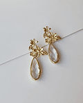 Aros con flores dorado y cristal transparente