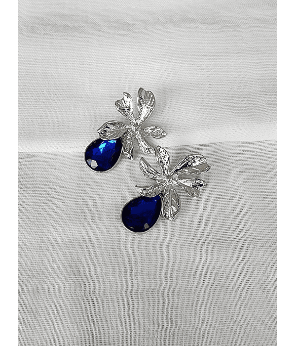 Aros flor plateada con cristal azul