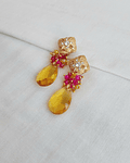 Aros amarillo con racimo fucsia