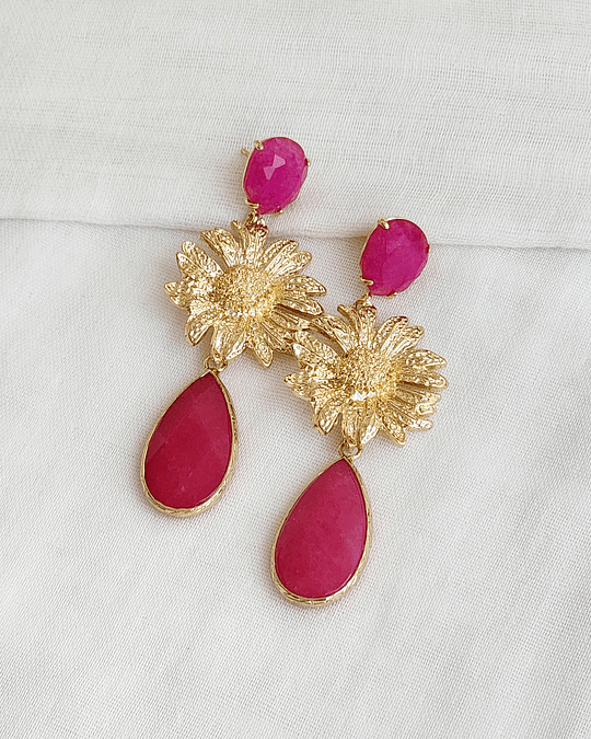 Aros fucsia con margarita dorada