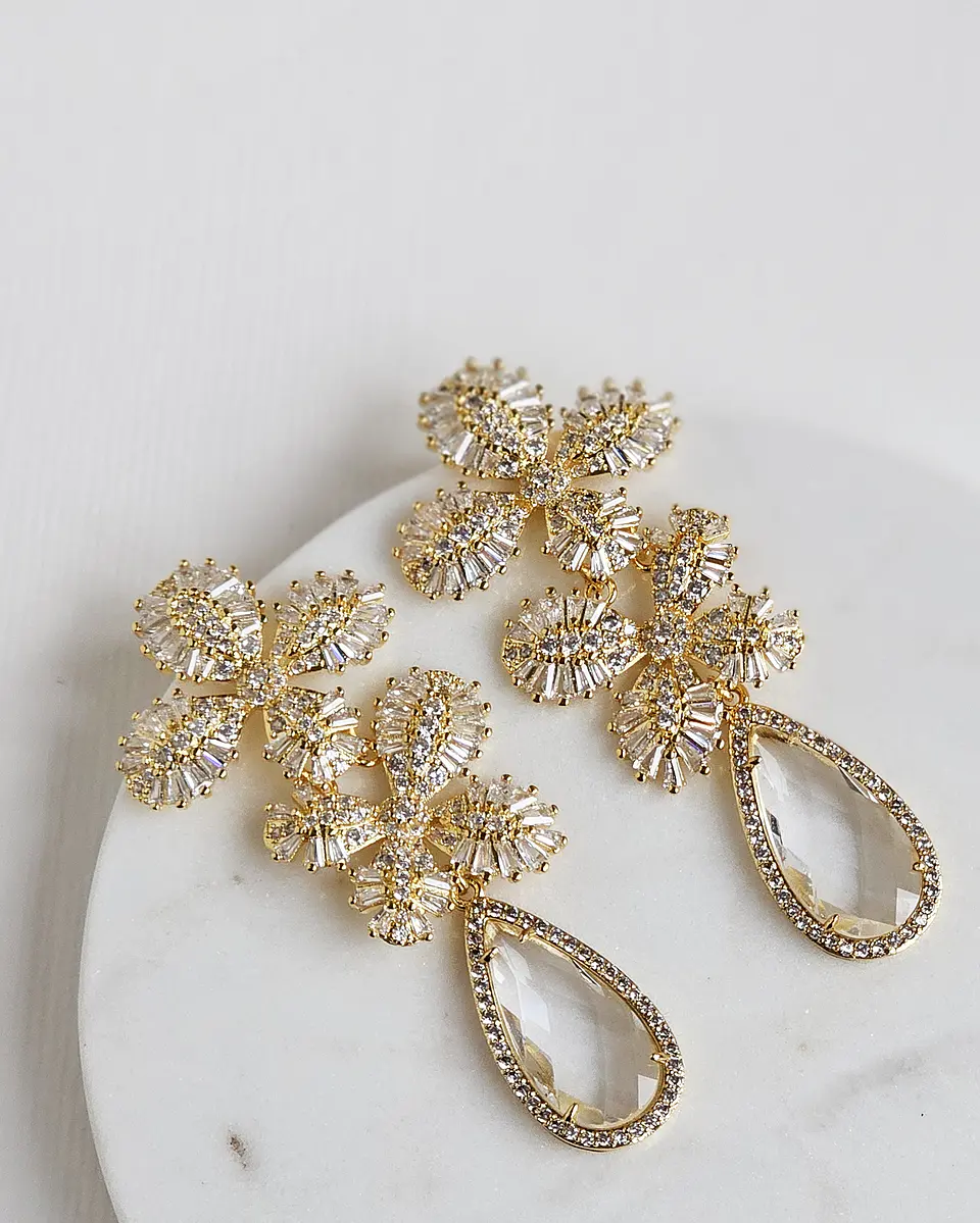Aros de doble flor de circonitas y cristal dorado 2