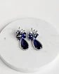 Aros de circonita con cristal azul y racimo - Miniatura 3