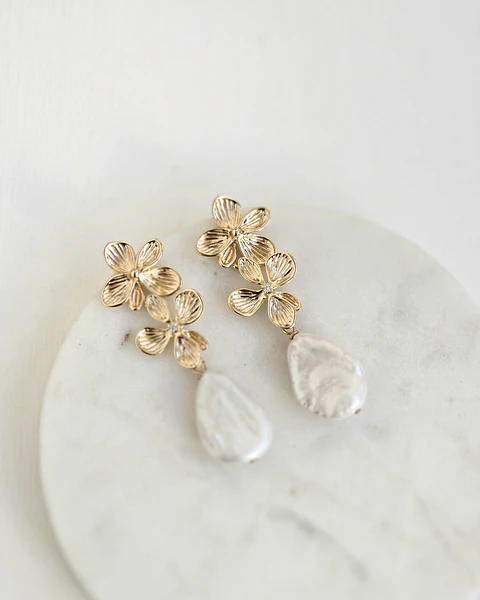 Aros doble flor con perla barroca natural