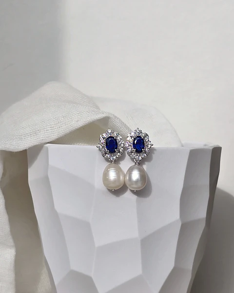 Aros circonitas con cristal azul y perla natural