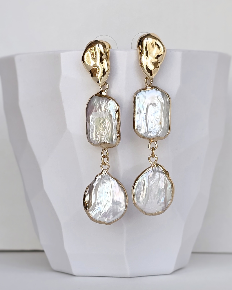 Aros largos de perlas distintas formas