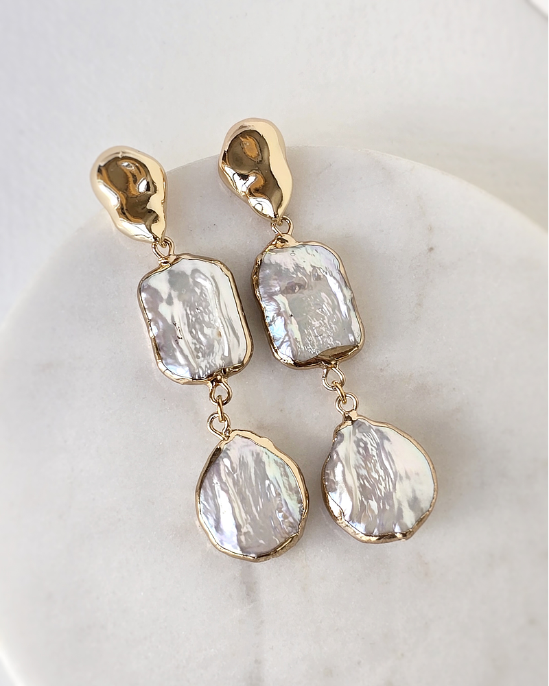 Aros largos de perlas distintas formas