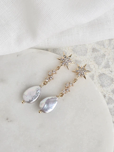 Aros estrellas circonitas con perla natural