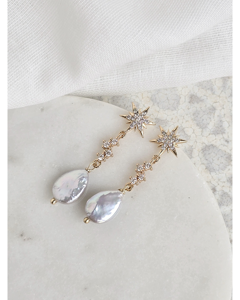 Aros estrellas circonitas con perla natural