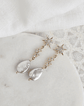 Aros estrellas circonitas con perla natural