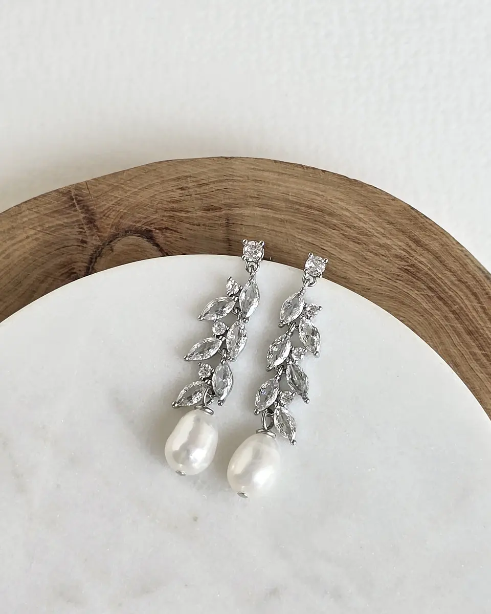 Aros circonitas hojitas y perla de río 1