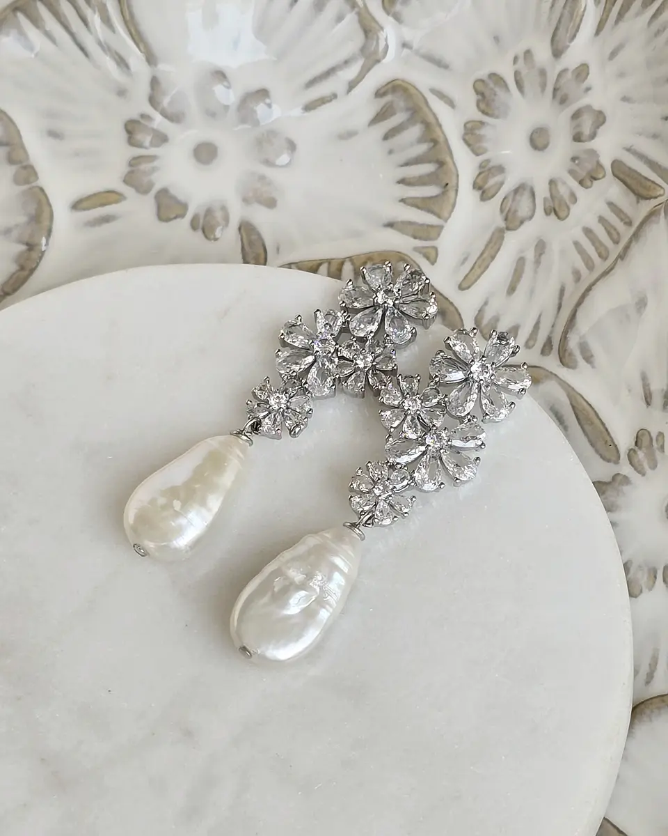 Aros flores circonitas y perla barroca 1
