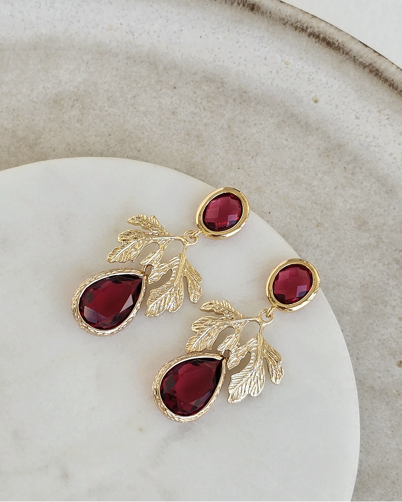 Aros rojo frambuesa con hoja al centro