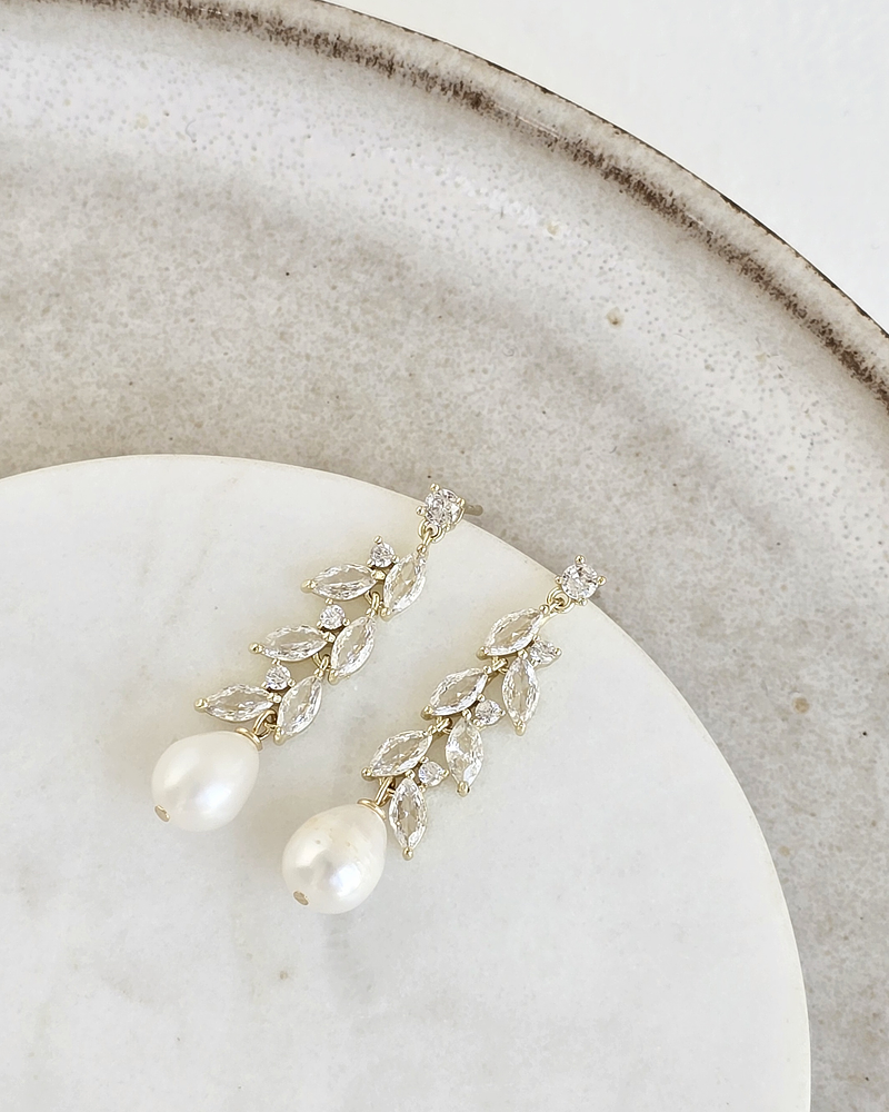 Aros hojitas de circonitas, perla de río oro