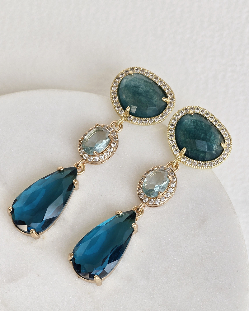 Aros petróleo y celeste con circonitas