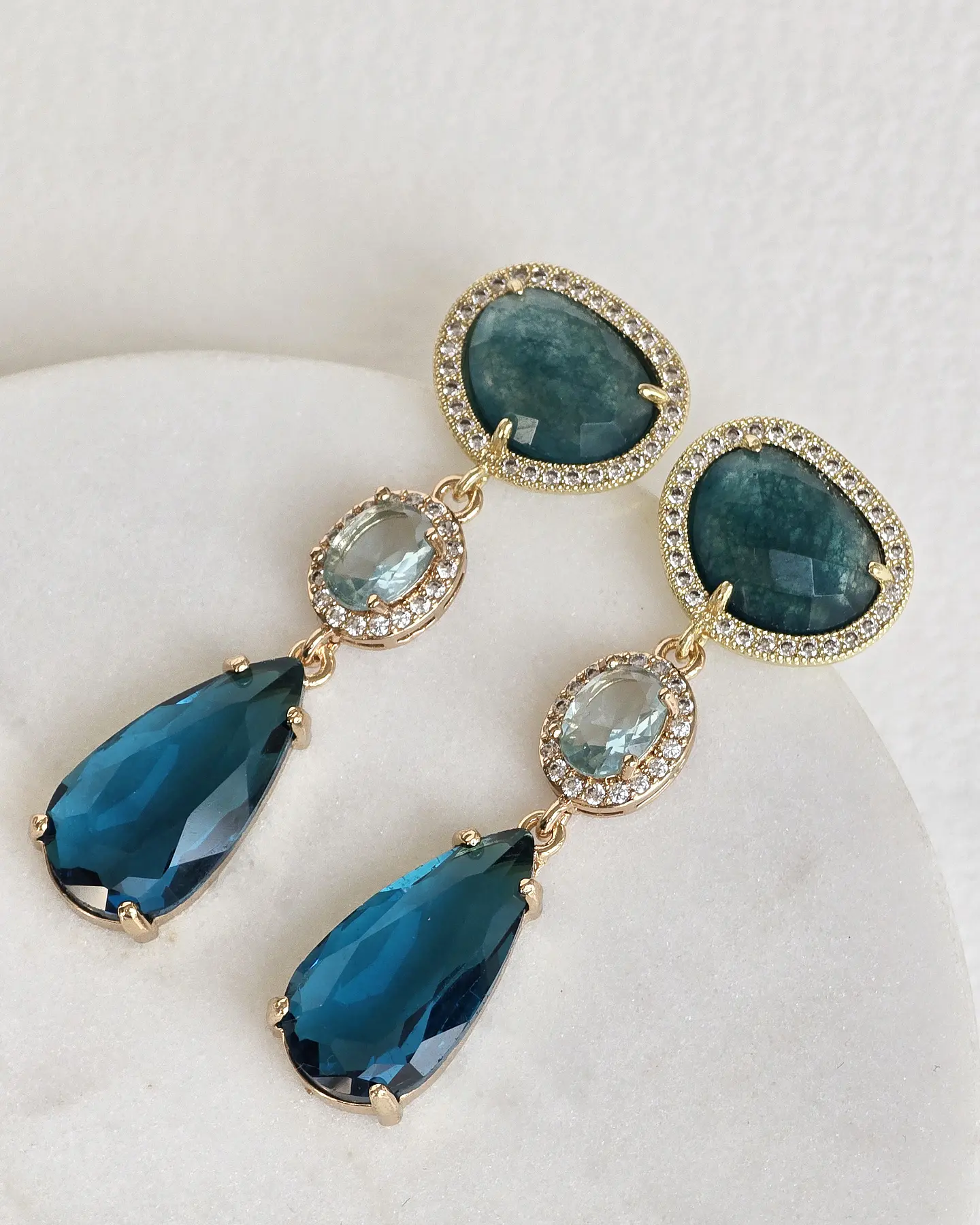 Aros petróleo y celeste con circonitas 1