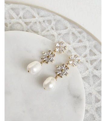 Aros con doble flor de circonitas y perla natural