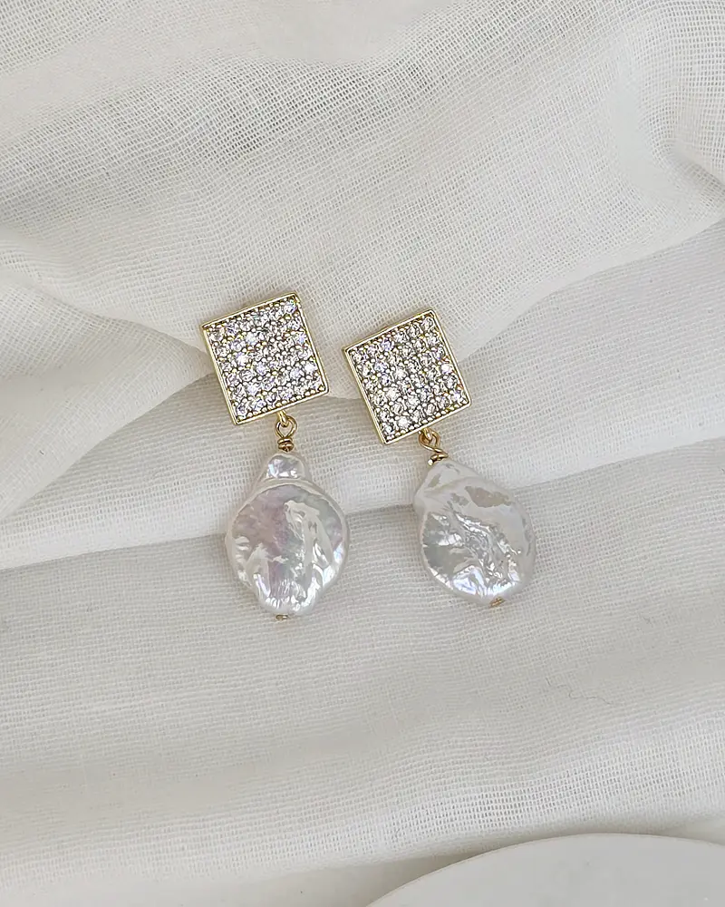 Aros circonitas y perla barroca