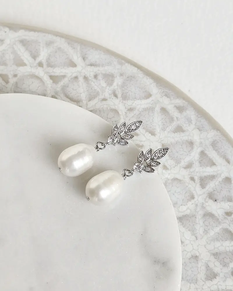 Aros hojita circonitas y perla de río silver
