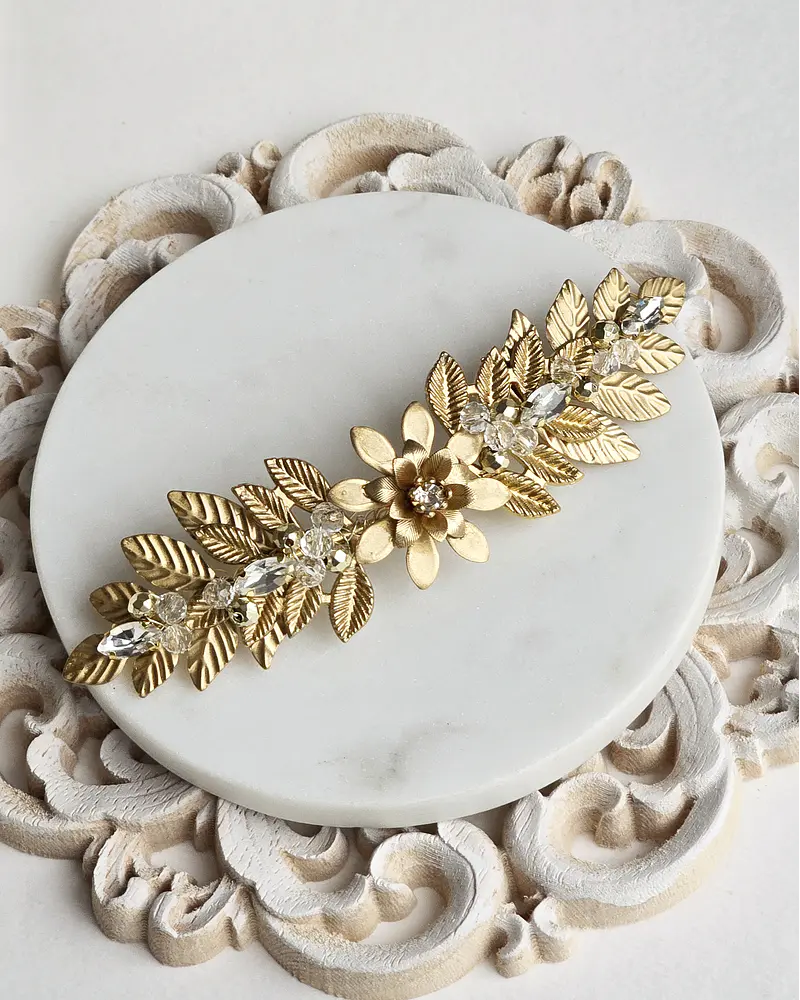 Tocado flor y hojas dorado