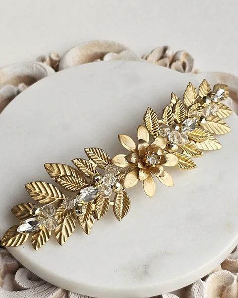 Tocado flor y hojas dorado