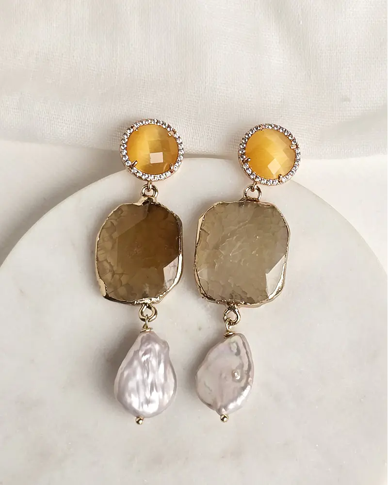 Aros amarillos con perla natural
