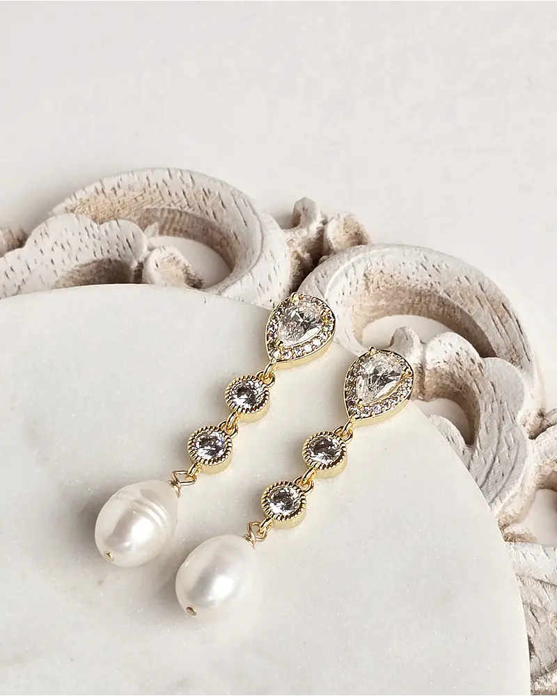 Aros circonitas clásicos con perla natural